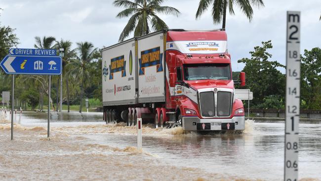 Sunday  February 9. Heavy rain causes flooding in North Queensland. Flooding at Plantation Creek in Ayr cuts Bruce Highway to traffic apart from trucks. Picture: Evan Morgan