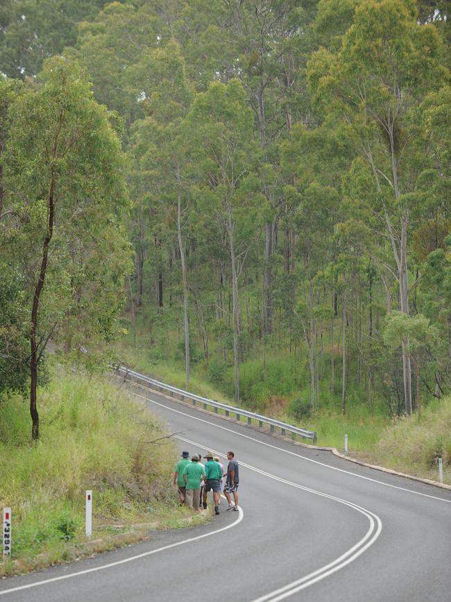 Family of the missing motorcyclist, Paul Stevenson, gather near the spot where the motorcycle was found along the Gin Gin Mount Perry road. Photo: File