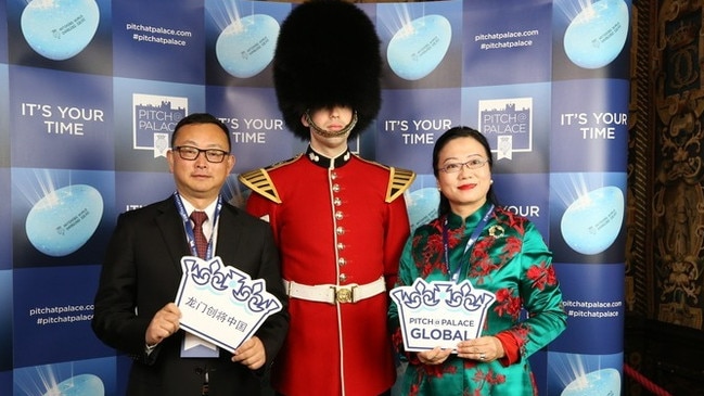 Yang Tengbo with a Grenadier Guard and an unidentified woman at a Pitch@Palace event