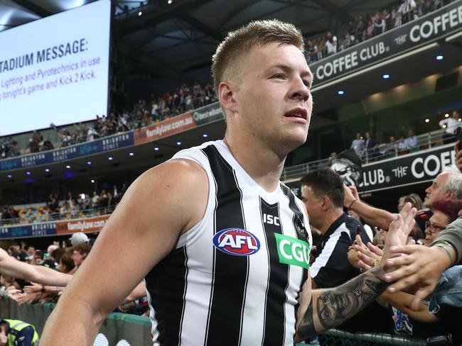 BRISBANE, AUSTRALIA - APRIL 18: Jordan De Goey of the Magpies celebrates winning the round 5 AFL match between Brisbane and Collingwood at The Gabba on April 18, 2019 in Brisbane, Australia. (Photo by Chris Hyde/Getty Images)