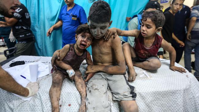 Injured Palestinian children arrive at Nasser Medical Hospital in Khan Yunis, on October 24, 2023. Picture: Getty Images