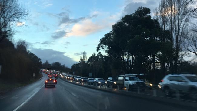 South-bound traffic banked up on the Southern Outlet approaching Mt Nelson after multiple car crashes. Picture: THOMAS YOUNG