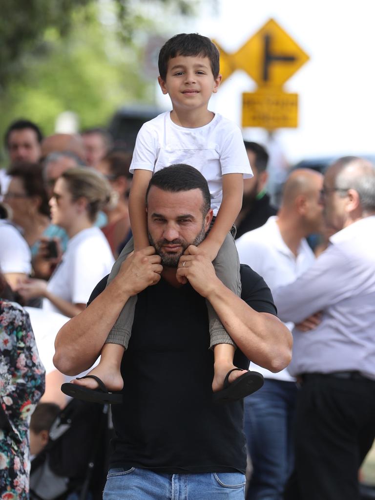 Danny walking among the crowds on Bettington Rd. Picture: John Grainger