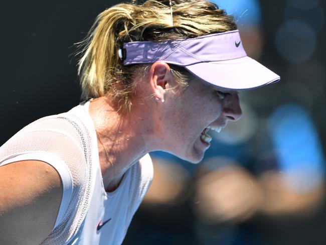 Russia's Maria Sharapova reacts after winning a point against Anastasija Sevastova.