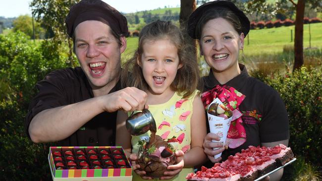 Thomas Wierinck, head Chocolatier from Belgium, Avery Harrison, 5, from Lower Templestowe and chocolaterie team member Morgan Barton are looking forward to the Strawberry Affair. Picture: Josie Hayden