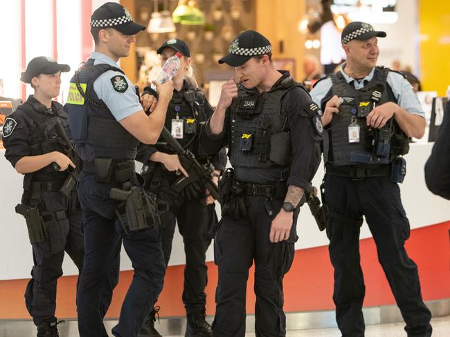 Heavily armed AFP uniformed officers at Sydney Airport today. Picture: Julian Andrews