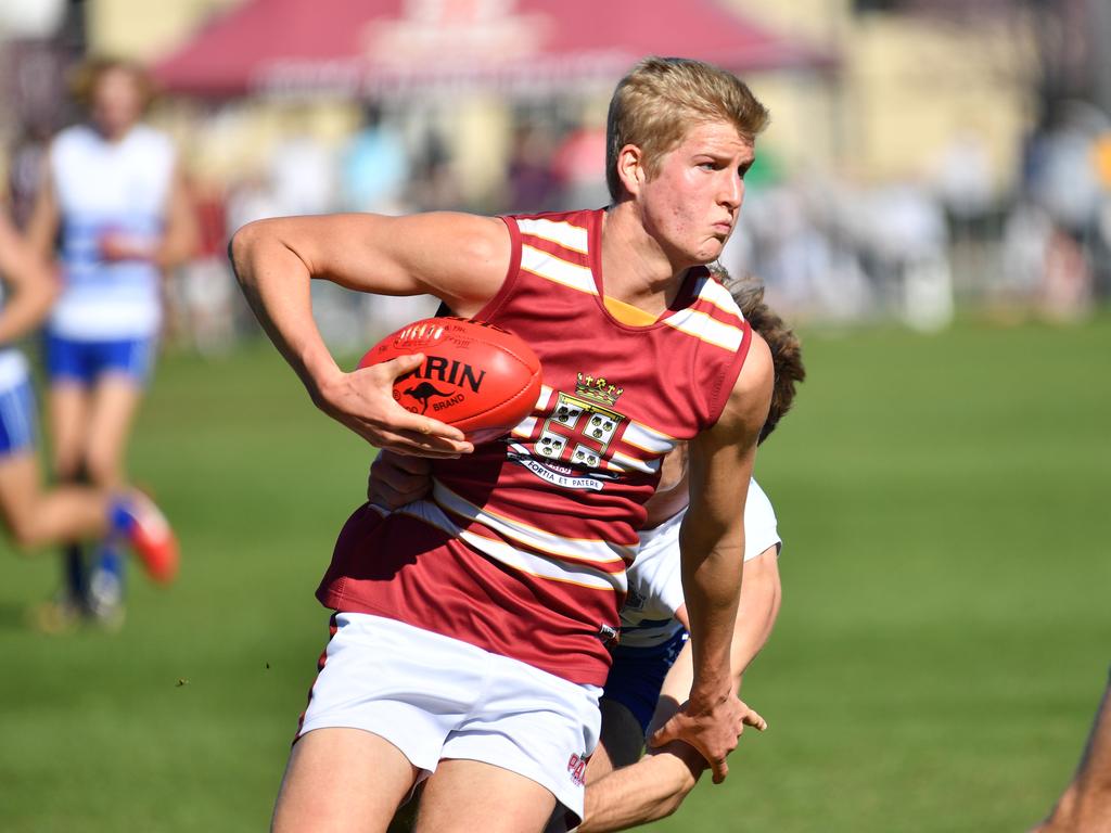 Prince Alfred’s Jack Heard shrugs a tackle against St Peter’s on Saturday. Picture: AAP/ Keryn Stevens.