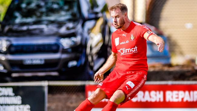 Iain Fyfe in action for Campbelltown City last season before taking on the role of the senior coach. Picture: Ken Carter