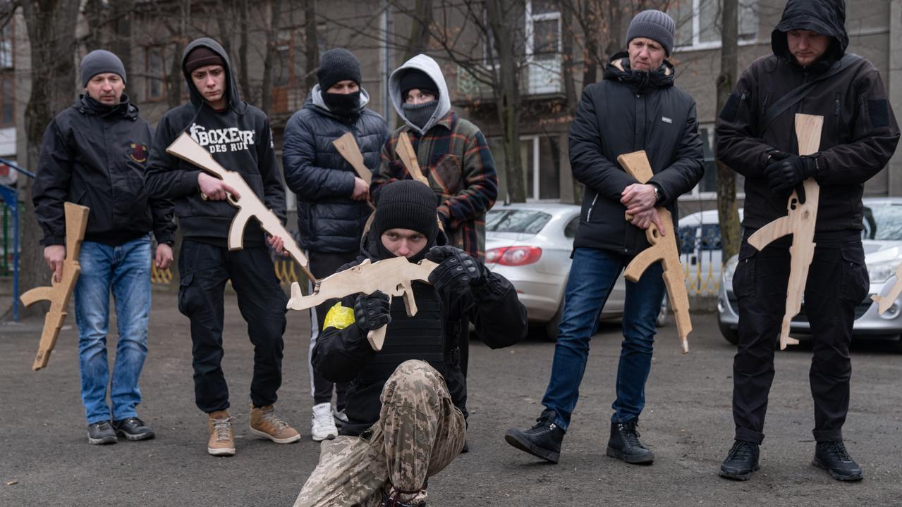 People take part in a basic military training session in Ivano-Frankivsk, Ukraine. Picture: Alexey Furman/Getty Images