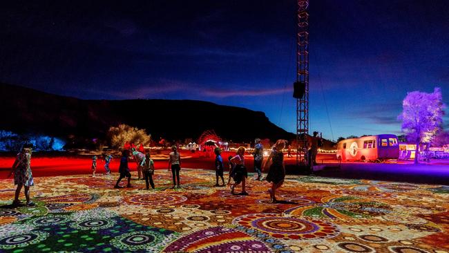 Grounded (Ahelhe Itethe), by Kathleen Wallace. Parrtjima will take over Alice Springs with 10 nights of light installations from a number Aboriginal artists set against the majestic MacDonnell Ranges. TNT supplied