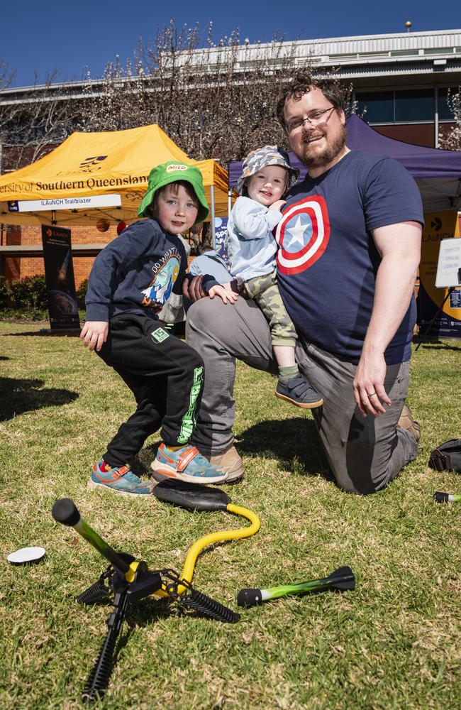 Launching an air-powered rocket are (from left) Alistair, Kaladin and Cameron Ryle at iLAuNCH Space family fun day, part of UniSQ's Open Day, Sunday, August 18, 2024. Picture: Kevin Farmer