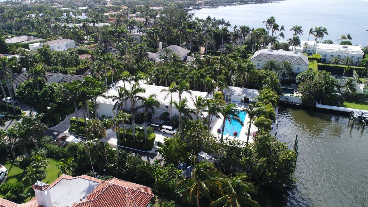 Girls were allegedly lured to Jeffrey Epstein’s large waterfront estate (above) not far from Donald Trump's Mar-a-Lago. Picture: Pedro Portal/Miami Herald/TNS/Getty