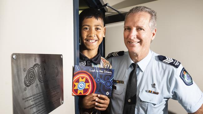 Jahmalakai Isaacs and Oakey officer-in-charge Sergeant John Cook with the Look to the Stars plaque after the unveiling at the station during NAIDOC Week, Friday, July 8, 2022. Picture: Kevin Farmer