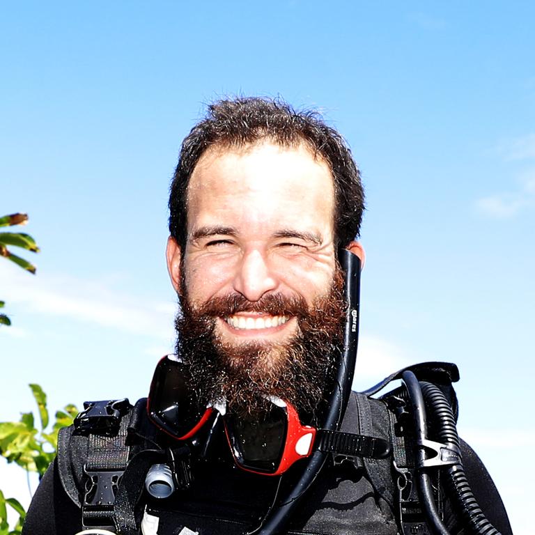 Gold Coast local Jon Cogged enjoys a dive off the Gold Coast / Tweed Coast Photo: Scott Powick Newscorp