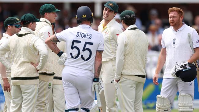 Australian captain Pat Cummins speaks with his English counterpart Ben Stokes of England after Jonny Bairstow was stumped Picture: Getty Images