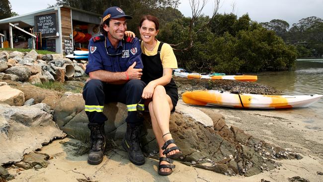 Josh and Kate Waterson co-own their cafe and paddleboard business. Josh is also a retained firefighter with NSW Fire and Rescue. Picture: Toby Zerna