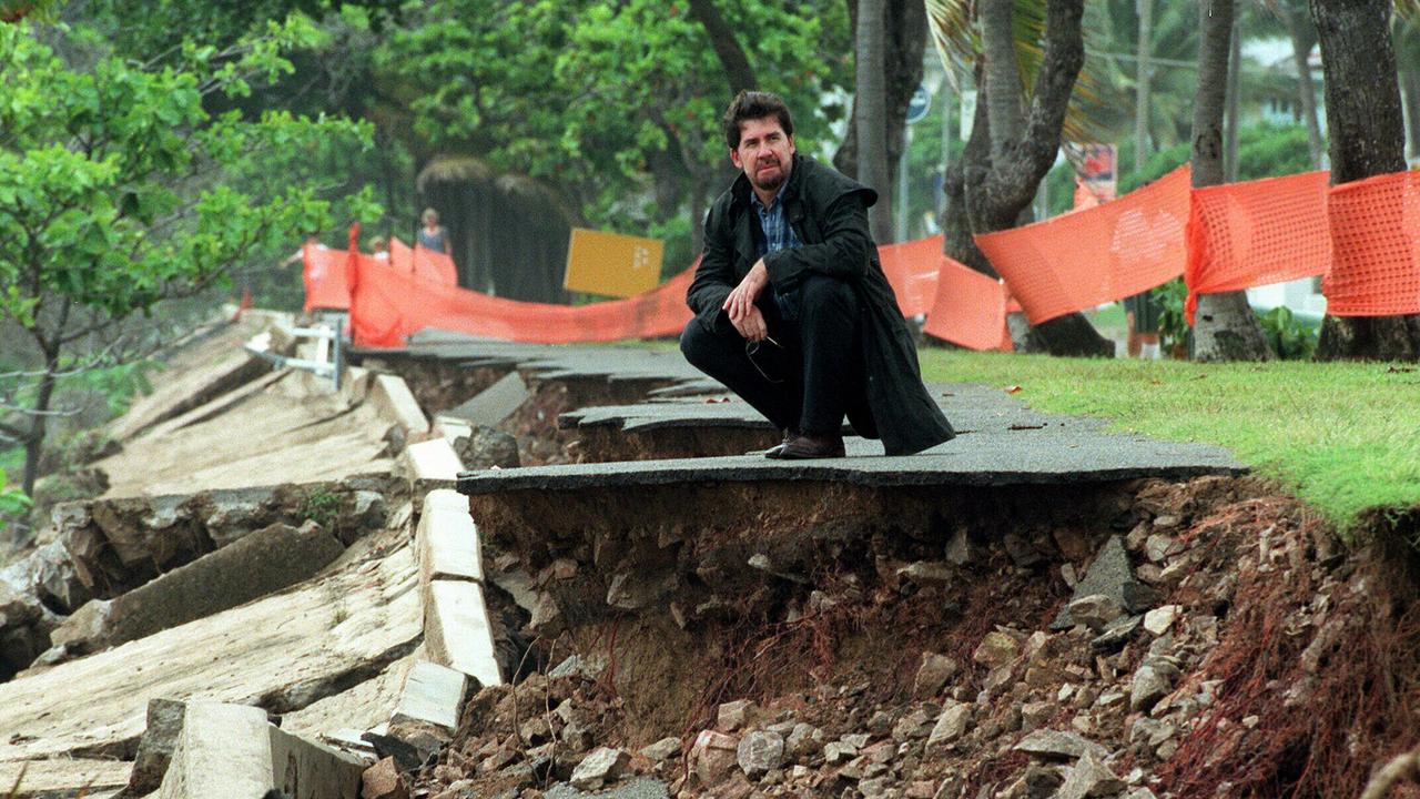 Mayor Tony Mooney inspects roads and other damage caused in Townsville by flooding and rainfall from cyclone Sid in January 1998. Picture Nathan Richter