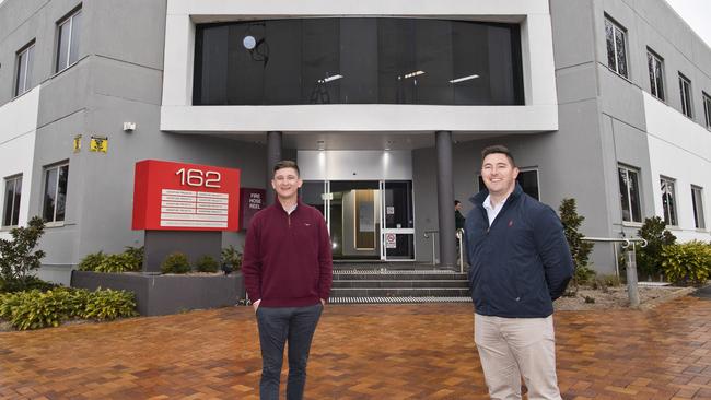 (From left) Chris Stewart and Dan Cullinane from LJ Hooker Commercial. 162 Hume St coming up for sale.