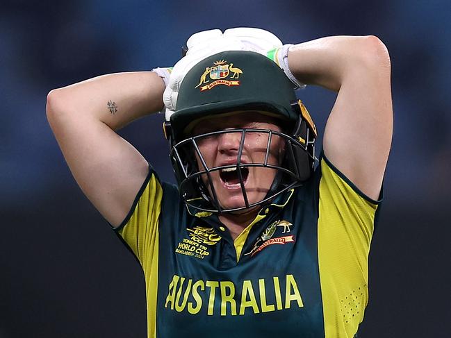 DUBAI, UNITED ARAB EMIRATES - OCTOBER 11: Alyssa Healy of Australia grimaces as she walks off after picking up an injury during the ICC Women's T20 World Cup 2024 match between Australia and Pakistan at Dubai International Stadium on October 11, 2024 in Dubai, United Arab Emirates. (Photo by Alex Davidson-ICC/ICC via Getty Images)