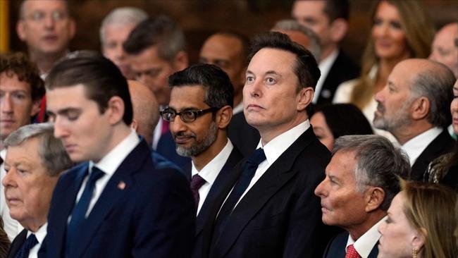 Google CEO Sundar Pichai (C, L) and SpaceX, X and Tesla CEO Elon Musk watch during the inauguration of Donald Trump. Picture: Julia Demaree Nikhinson/AFP