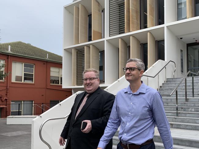 Rape accused Vaughan Rogers (right) leaves Wollongong Local Court with his lawyer on May 1.
