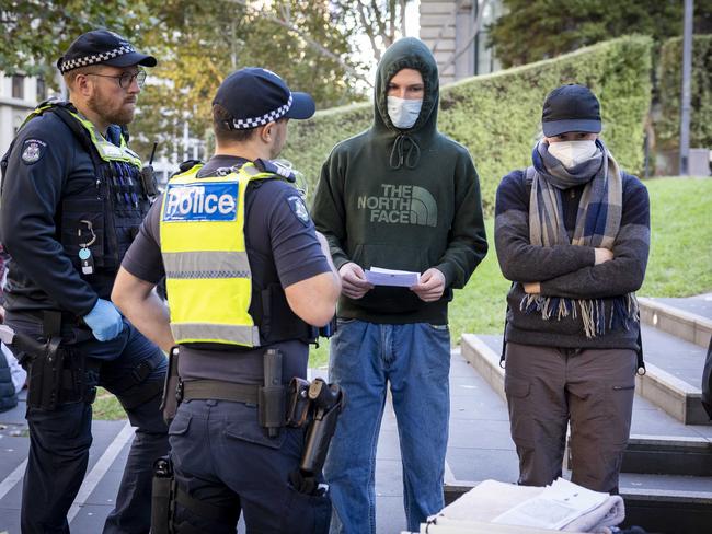 Protesters were encouraged to wear masks. Picture: Jake Nowakowski