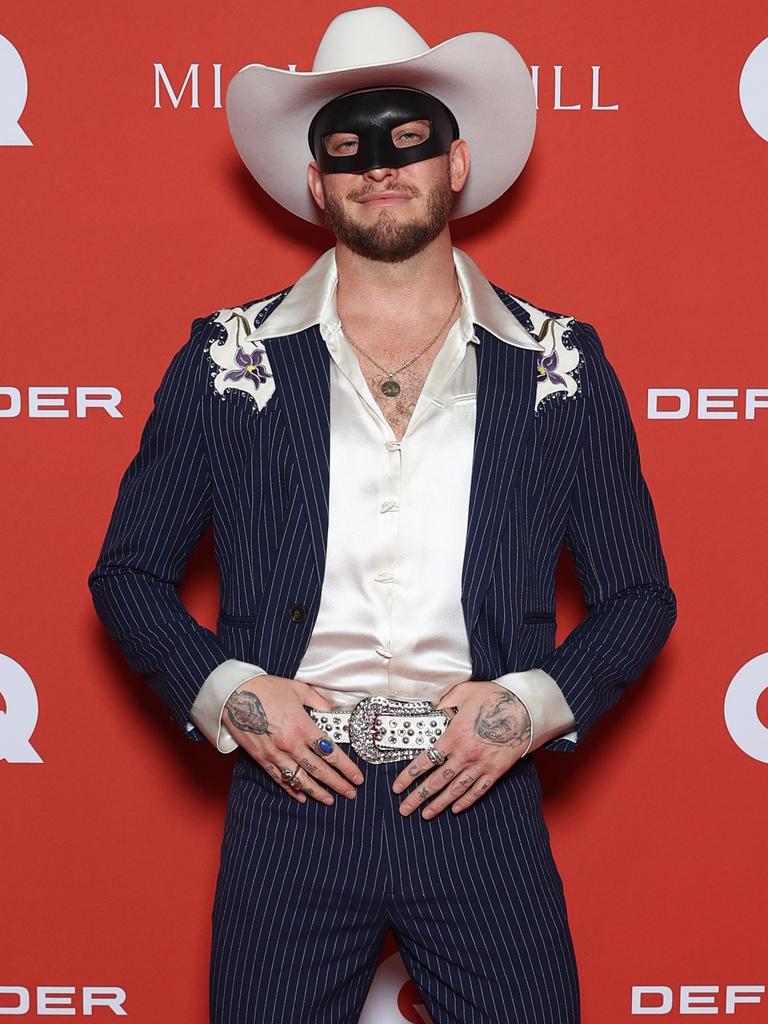 Country star Orville Peck wore his usual attire as he posed for pictures. Photo: Brendon Thorne/Getty Images.