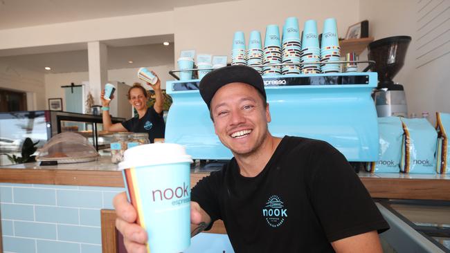 Nook has finally got a shop to move into. After a year of uncertainty they are moving from a cart into a shop at the front of the Burleigh Arcade . Owner Marcus Wilkins and staff happily settling in. Picture Glenn Hampson