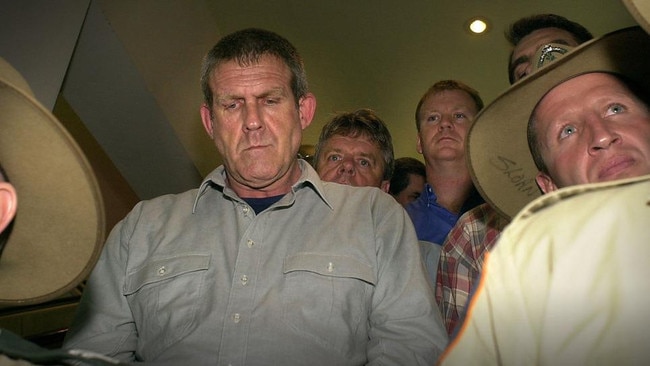 15/11/2003: Bradley John Murdoch arrives under police escort at Darwin Airport to face murder charges of British backpacker Peter Falconio. Picture: PATRINA MALONE