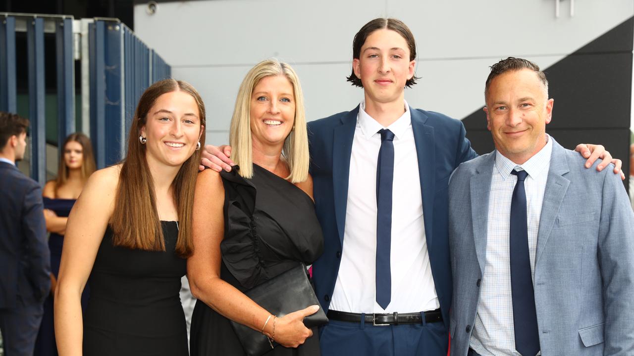 Noah Moore with sister Remi and parents Sally and Kieron at the Belmont High School year 12 graduation at GMHBA Stadium. Picture: Alison Wynd