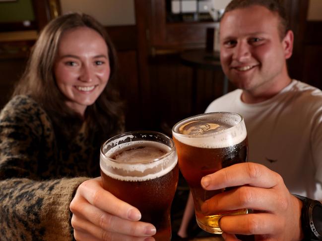 OCTOBER 11, 2021: 12:01AM  Darcie Hill and Michael Cody have Sydney's first post-lockdown beers at the Fortune of War Pub in the Rocks.Picture: Damian Shaw