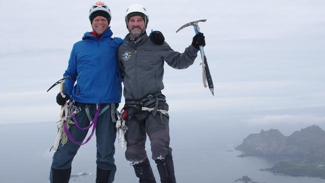 Mountaineers ... Scaling the 862m-high Snow Peak on the islands northwest made a nice break from paddling for John and Andrew. Picture: Andrew Maffett