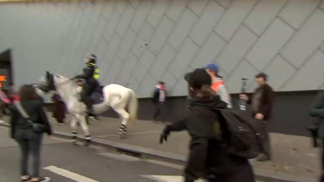 Protesters threw manure at police. Picture: Sunrise