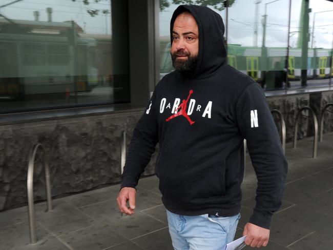 Nabil Maghnie outside a Melbourne police station. Picture: Andrew Henshaw