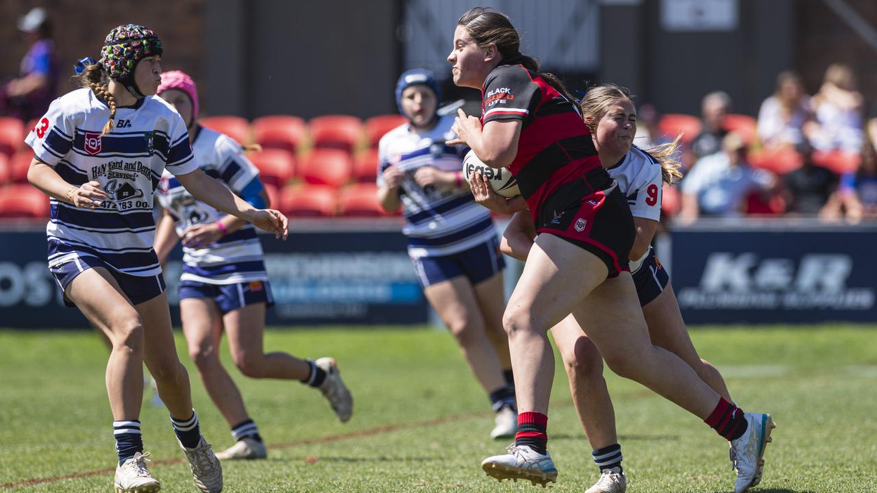 Lara Yaxley on the move for Valleys runs at Tiahna Dean (left) of Brothers in U15 girls Toowoomba Junior Rugby League grand final at Toowoomba Sports Ground, Saturday, September 7, 2024. Picture: Kevin Farmer