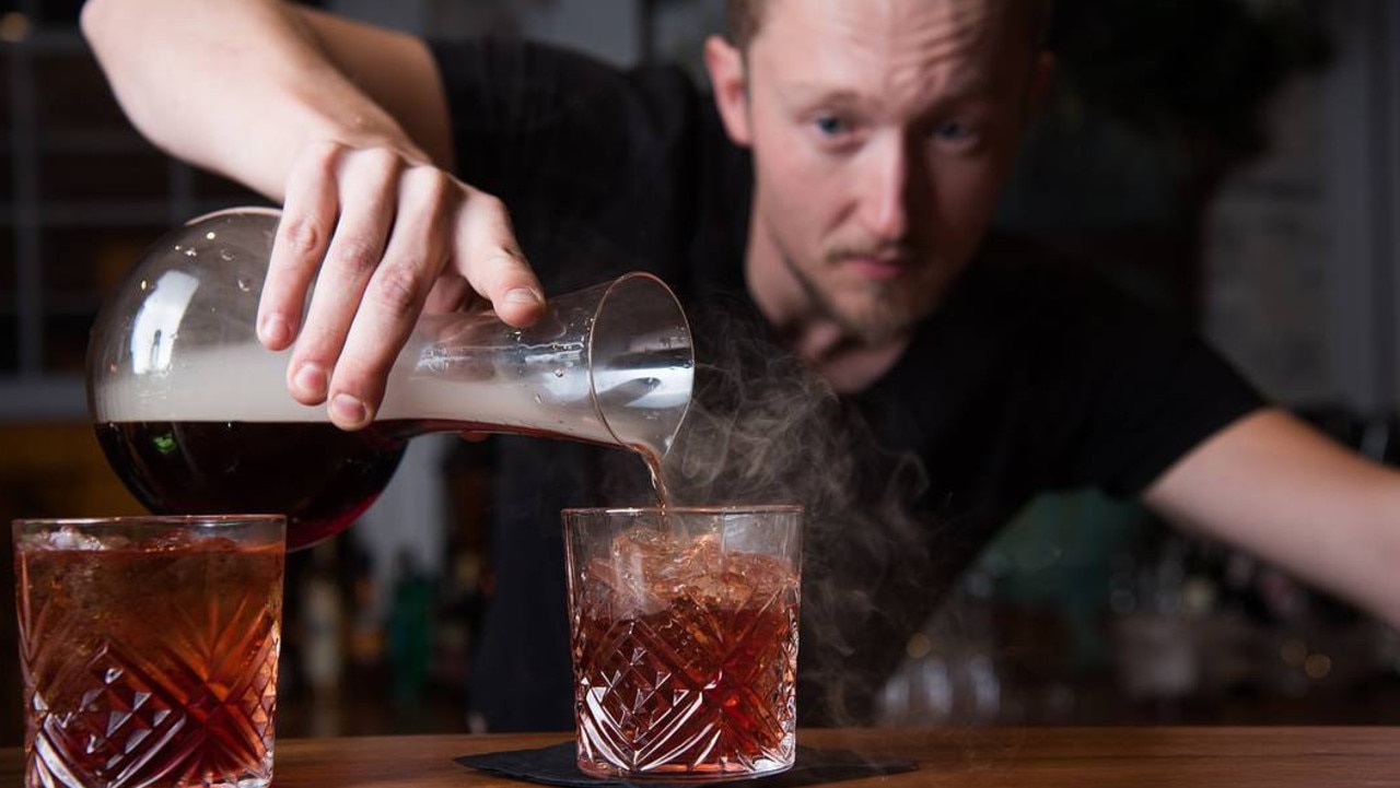 A bartender serves up a Smoking Negroni at Howard’s Cantina, Erskineville. Picture: Supplied