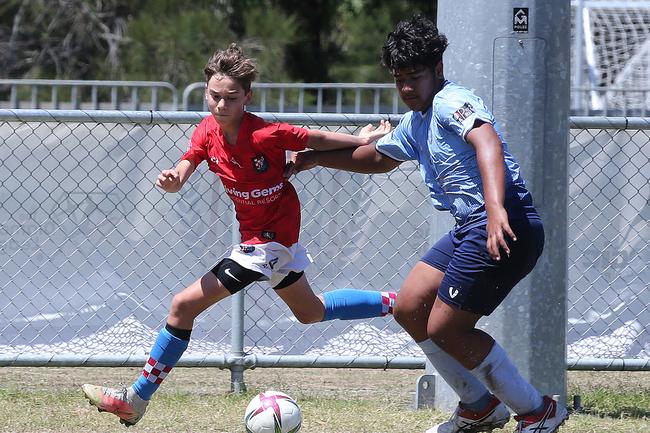 The Premier Invitational football tournament on the Gold Coast. Gold Coast Knights Red v Springfield United under-13s in action. Picture: Mike Batterham.