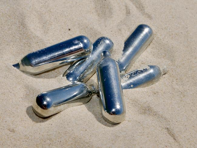 Nangs littered on Surfers Paradise beach during Schoolies last year. Photo: Nathan Richter