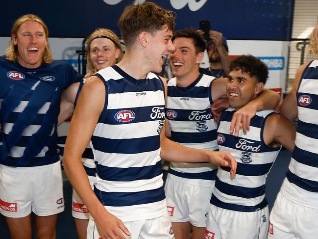 GEELONG, AUSTRALIA - APRIL 14: Debutant, Connor O'Sullivan of the Cats sings the team song during the 2024 AFL Round 05 match between the Geelong Cats and the North Melbourne Kangaroos at GMHBA Stadium on April 14, 2024 in Geelong, Australia. (Photo by Michael Willson/AFL Photos via Getty Images)