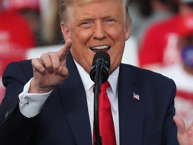 THE VILLAGES, FLORIDA - OCTOBER 23: U.S. President Donald Trump speaks during his campaign event at The Villages Polo Club on October 23, 2020 in The Villages, Florida. President Trump continues to campaign against Democratic presidential nominee Joe Biden leading up to the November 3rd Election Day.   Joe Raedle/Getty Images/AFP == FOR NEWSPAPERS, INTERNET, TELCOS & TELEVISION USE ONLY ==