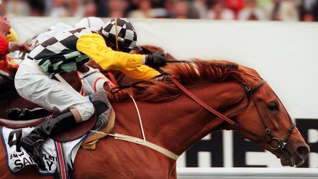 Saintly, ridden by Beadman, finishes strongly in the run to the post to score a narrow victory in the 1996 Cox Plate.