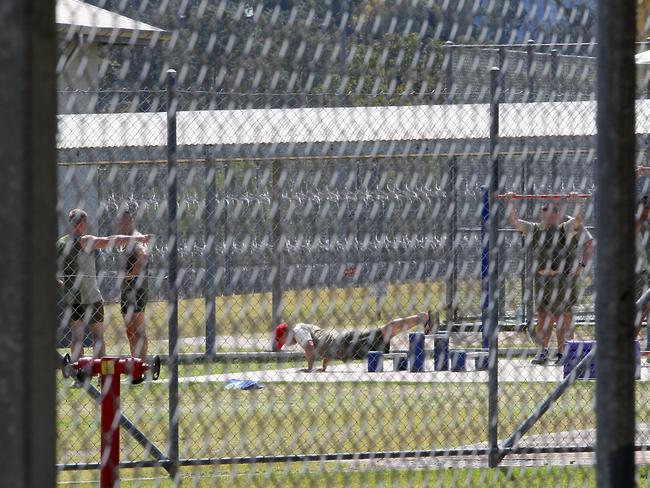 Inmates in an exercise yard at Woodford Correctional Centre