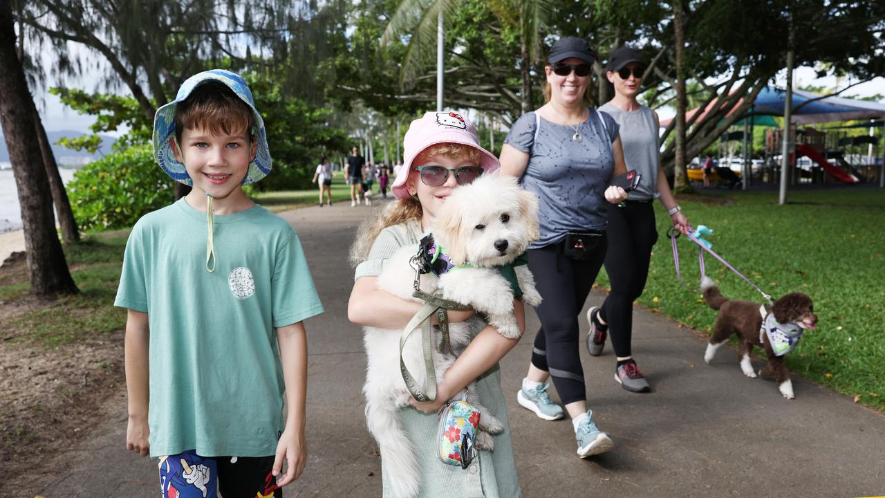 John Henderson, 9, Zara Henderson, 9, Luna, Peita Tippett and Megan McQuillan with Sadie all participated in the RSPCA's Million Paws Walk fundraiser, held along the Cairns Esplanade. Picture: Brendan Radke