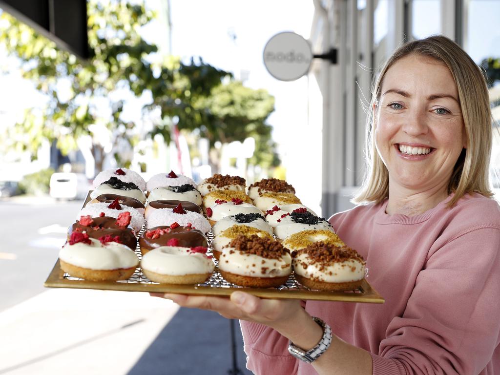 Kate Williams from Nodo cafe bakery in Newstead, Brisbane. The business has adapted during the COVID-19 pandemic, introducing new product lines, online sales and delivery options that are set to become permanent. Picture: Josh Woning.