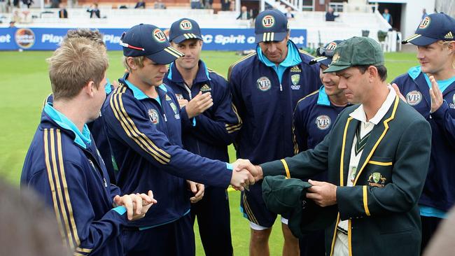 Ricky Ponting presents the baggy green cap to Tim Paine before the First Test between Pakistan and Australia at Lords on July 13, 2010 in London. Picture: Hamish Blair/Getty Images