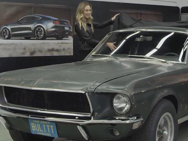 Molly McQueen reunited with her late grandfather's original Bullitt Ford Mustang from the 1968 movie and unveils the latest model at Detroit Auto Show January 2018. Picture: Supplied.