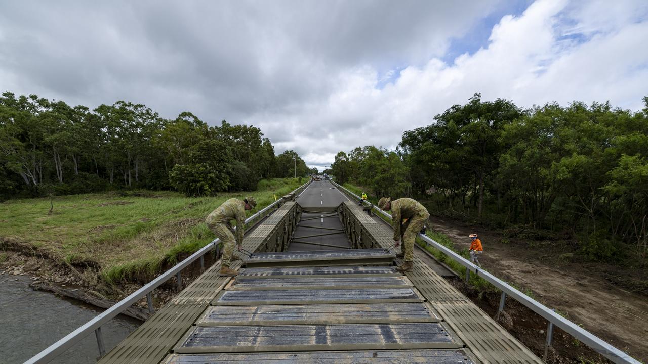 Australian Army soldiers from the 3rd Combat Engineer Regiment assemble a Medium Girder Bridge at Ollera Creek.