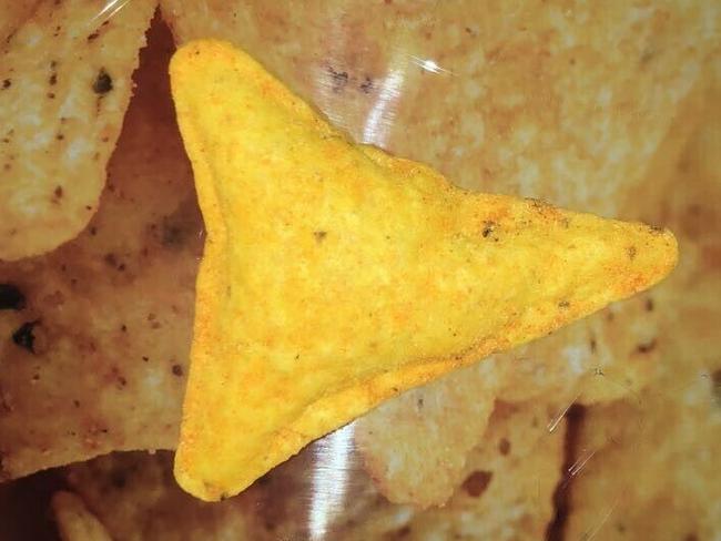 eBay photos of the inflated corn chip that is now listed for more than $20,000.