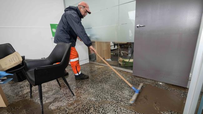 Clean-up begins at the Barry Plant office. Picture: Tony Gough