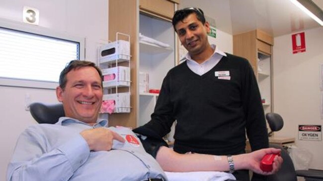 Blacktown Mayor Stephen Bali with nurse Darshan Madhukanth Shah.